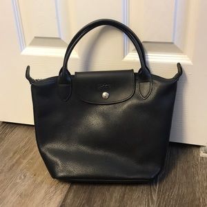 Longchamp black leather purse.